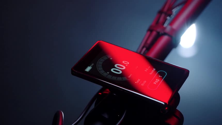 The red light reflects on the cell phone