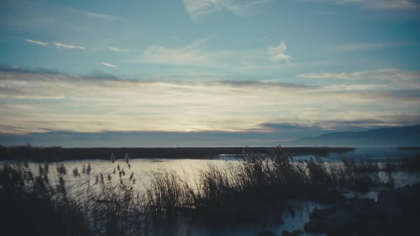 Sky reflecting on a lake at morning