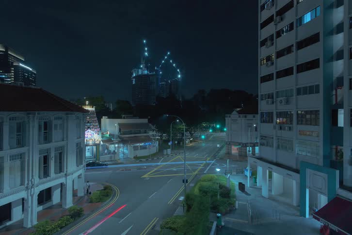 Time lapse of skyscrapers constructions seen from the city street with apartments and intersection