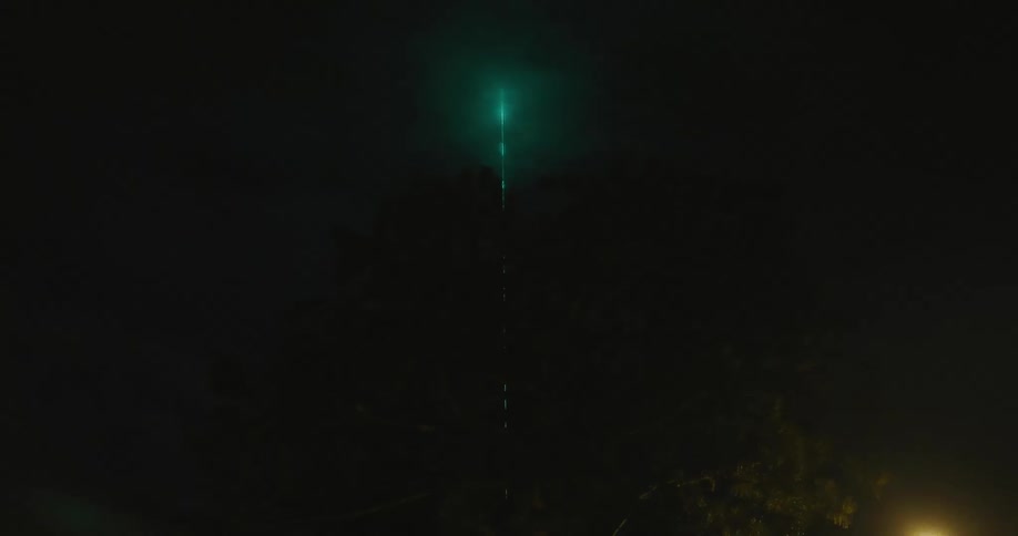 Green Laser in the Night Sky
