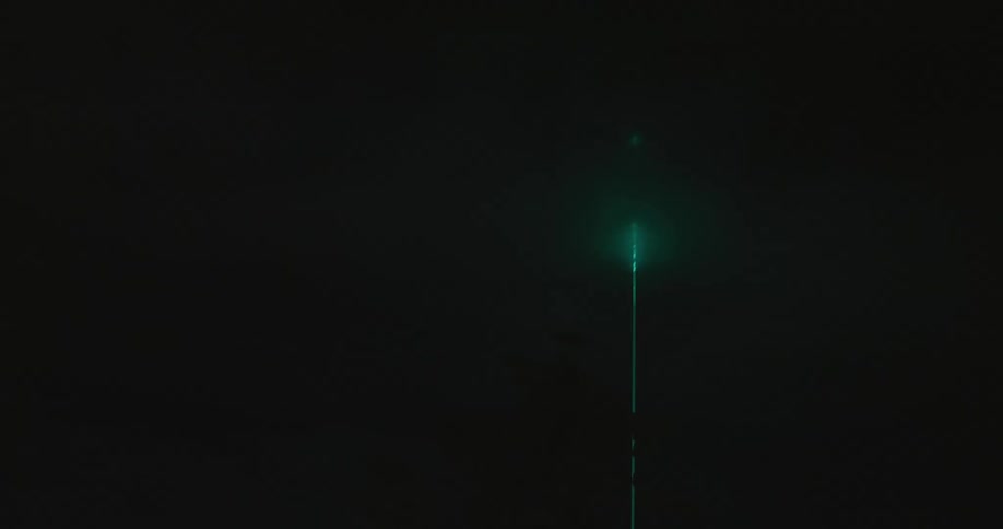 Green Laser in the NIght Sky