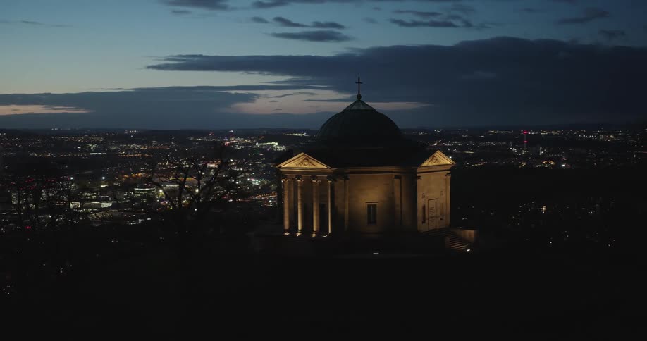Aerial of a temple on top of a hill in the metropolitan city