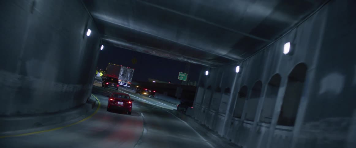 Expressway with calm traffic in the city at night