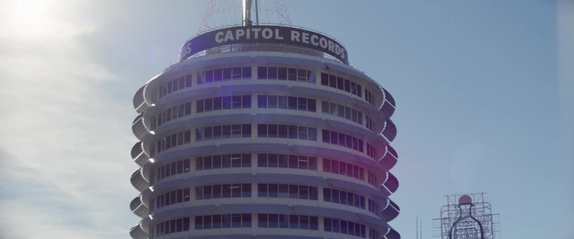 Capitol records building seen from a moving vehicle