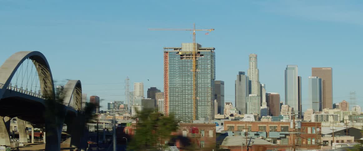 A bridge leads into the city
