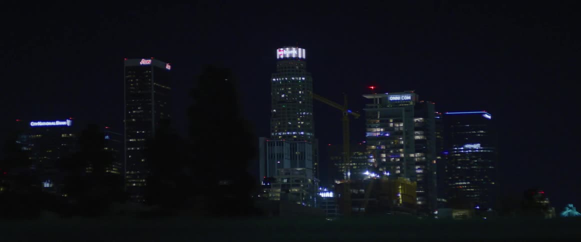 Skyline of the city at night seen from a moving vehicle