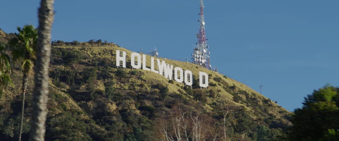 The hollywood sign is on the mountain