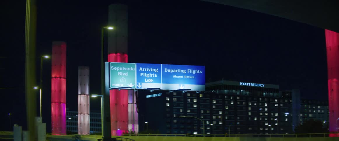 Colorful columns on the highway in the city at night