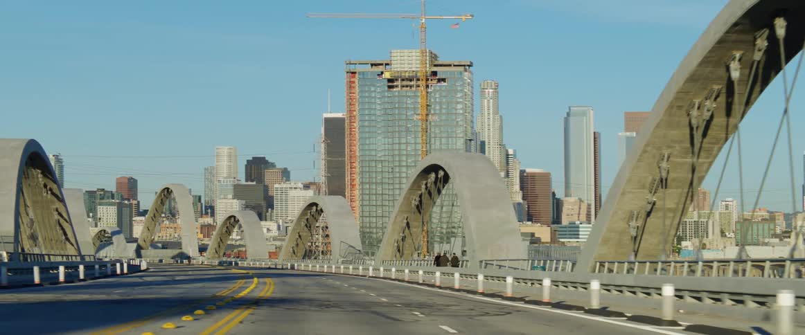 Six street bridge in los angeles seen from a moving vehicle