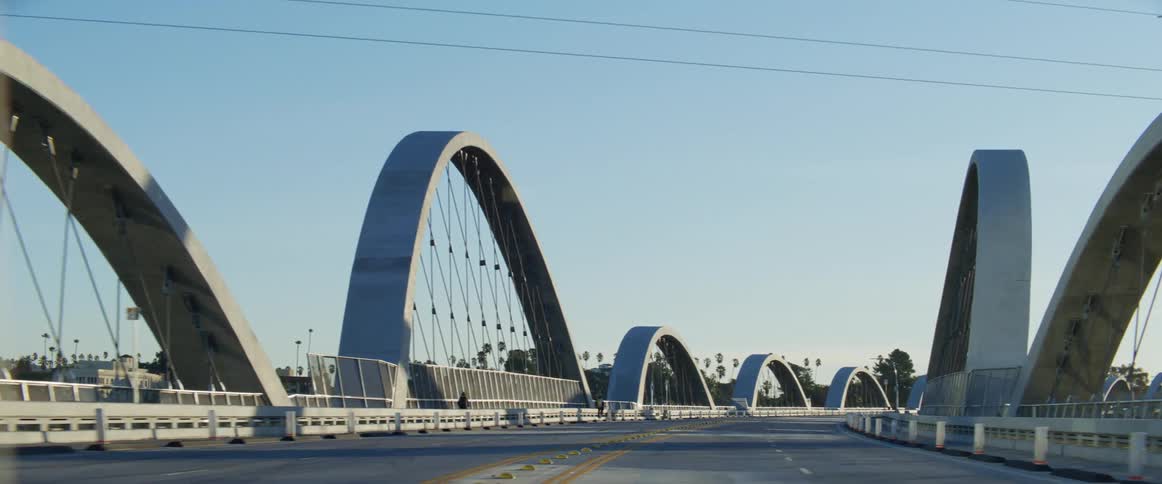 Arches of a road bridge on a sunny day