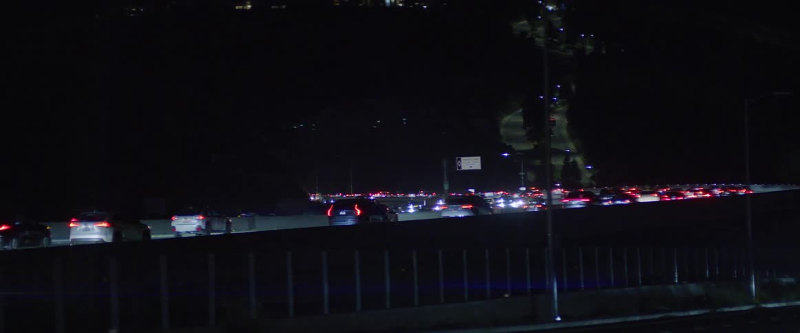 Heavy traffic is on the freeway at night