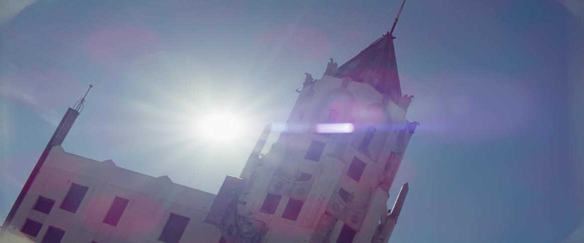The sun is shining above the church