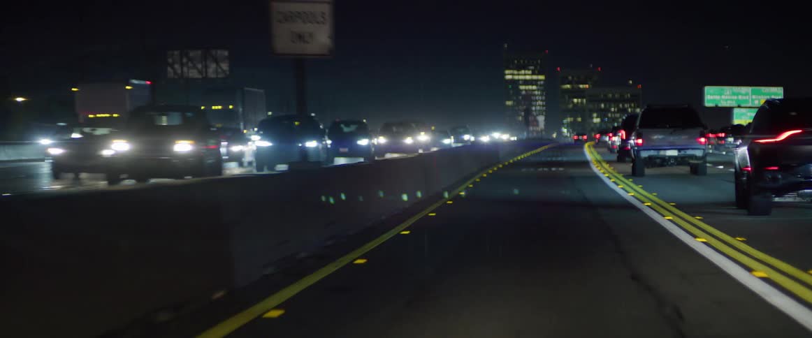 Heavy traffic on a highway at night in the urban city