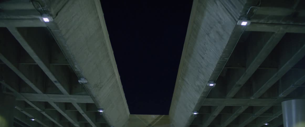 Driving under a highway in the city
