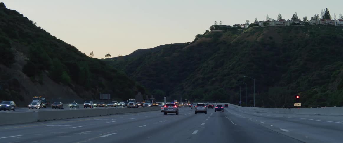 A clip of a busy freeway with cars