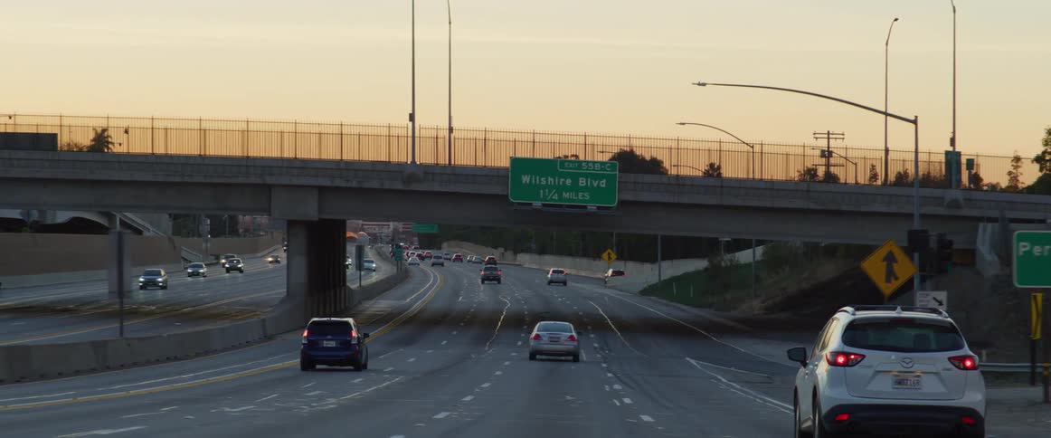 A busy expressway in the urban city during sunset