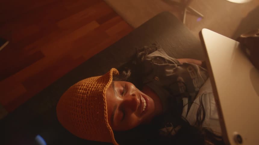 Woman having fun with a tablet at home