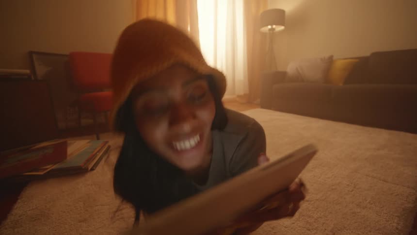 Close up of a woman having fun using a tablet