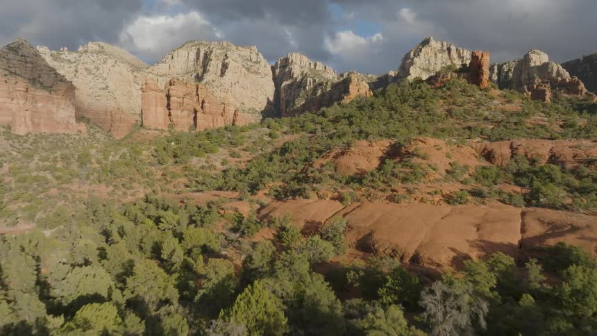 An aerial clip of a forest mountain