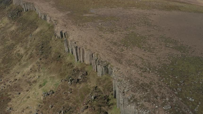 Aerial view of a cliff in the mountains