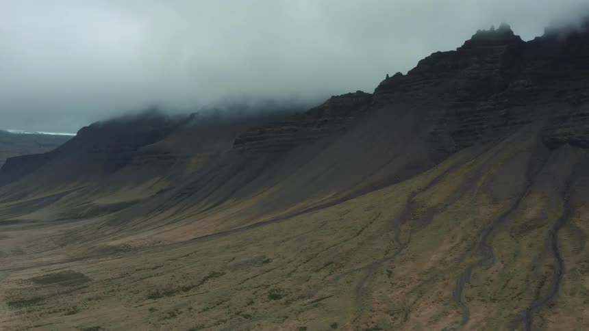 Low lying clouds cover mountain ridges