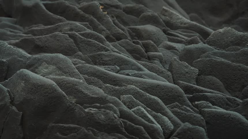 Close up of shapes in the sand or rock slabs