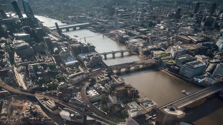 Timelapse of boats crossing the thames in london seen from above