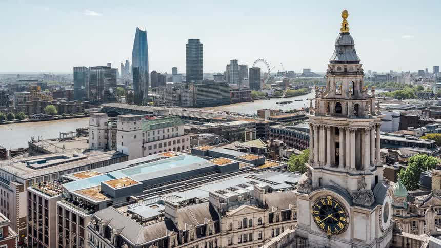 Aerial of a clock tower and city skyline