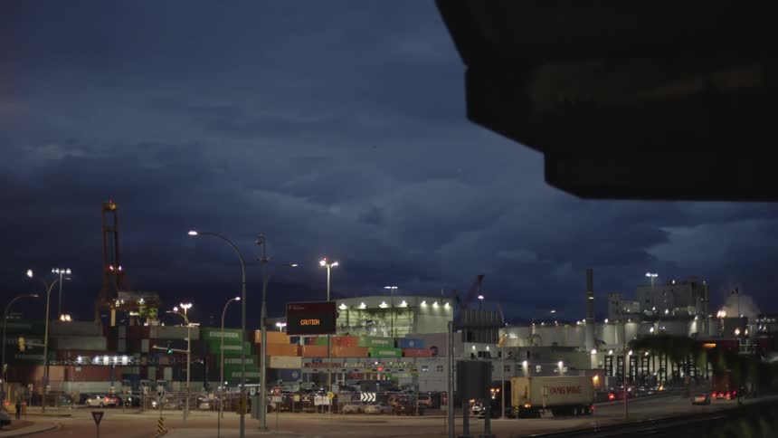 Traffic travels through the city port at night