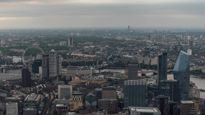 Aerial of londons skyscrapers and the river thames on a cloudy day