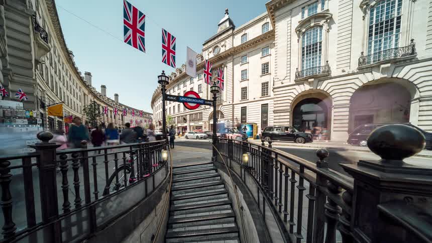 Pedestrians and tourists walking on the streets of london