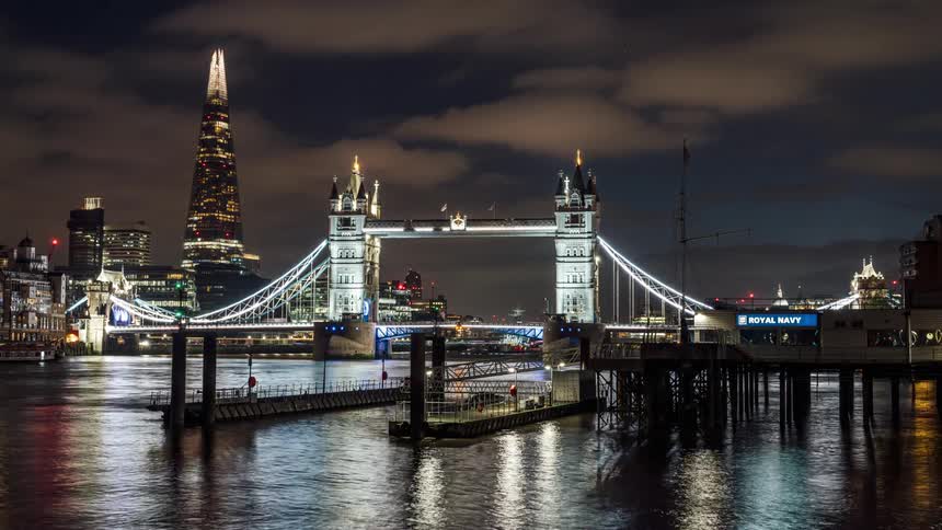 A night clip of a bridge decorated with light