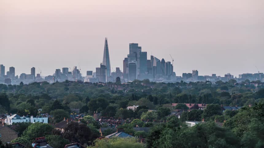 A city of tall buildings is in the distance