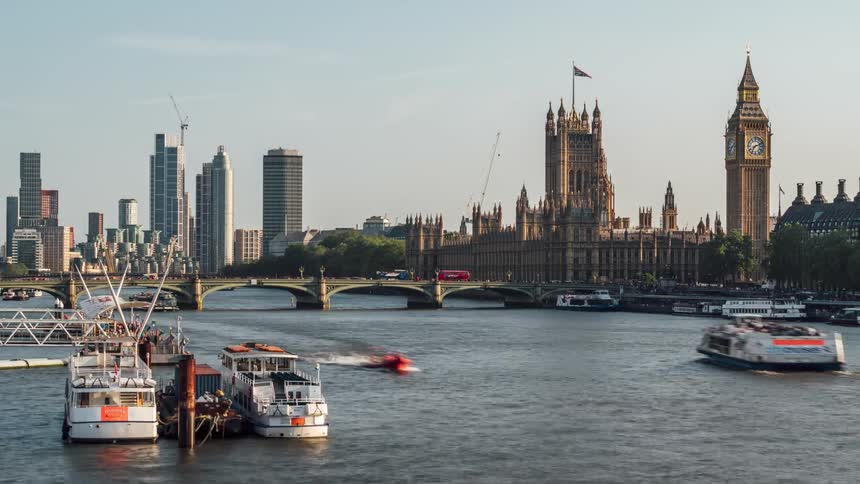Boats travel through the river in the city