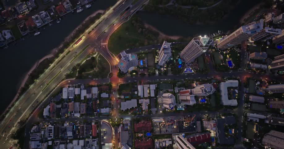 Aerial view of metropolitan city with a highway at dusk