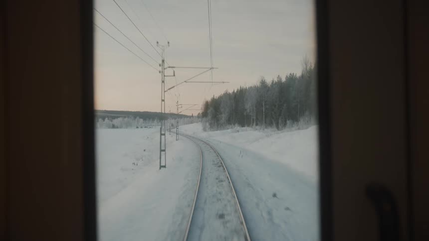 A clip of a rail way closer to the woods