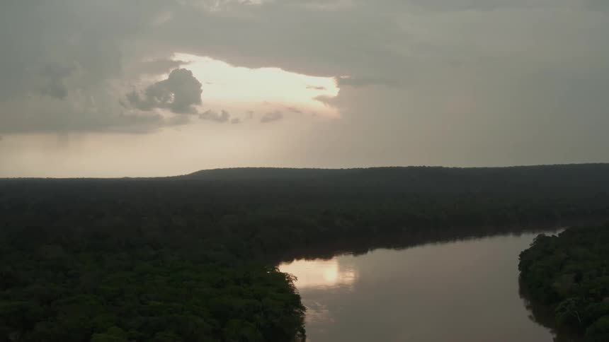 Heavy clouds are over the river