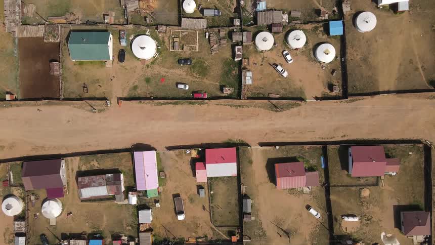 Aerial view of clusters of houses in a thirdworld residential neighborhood