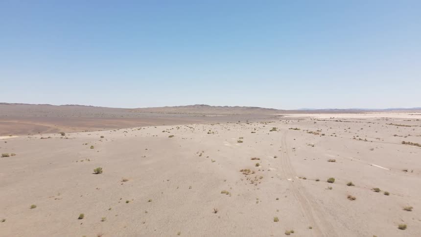 The desert under a bright blue sky