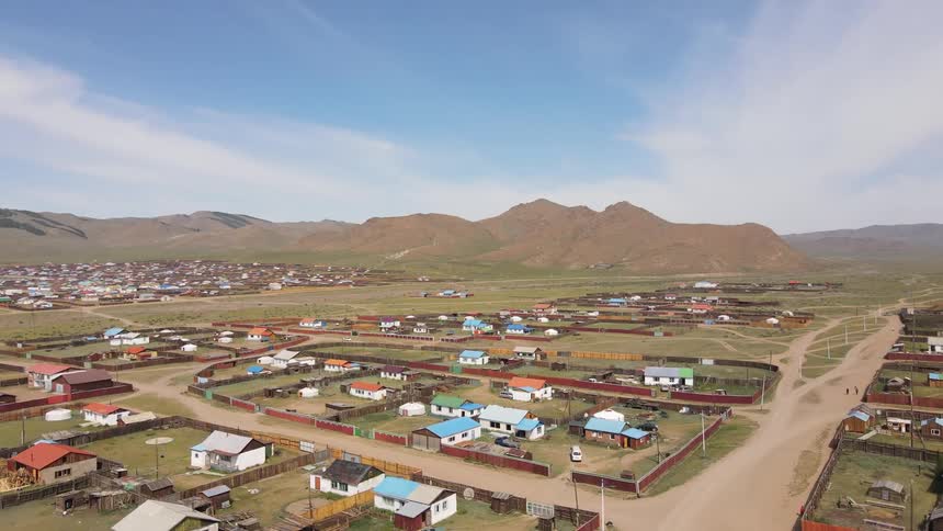 Skyline of a rural town with small colorful houses