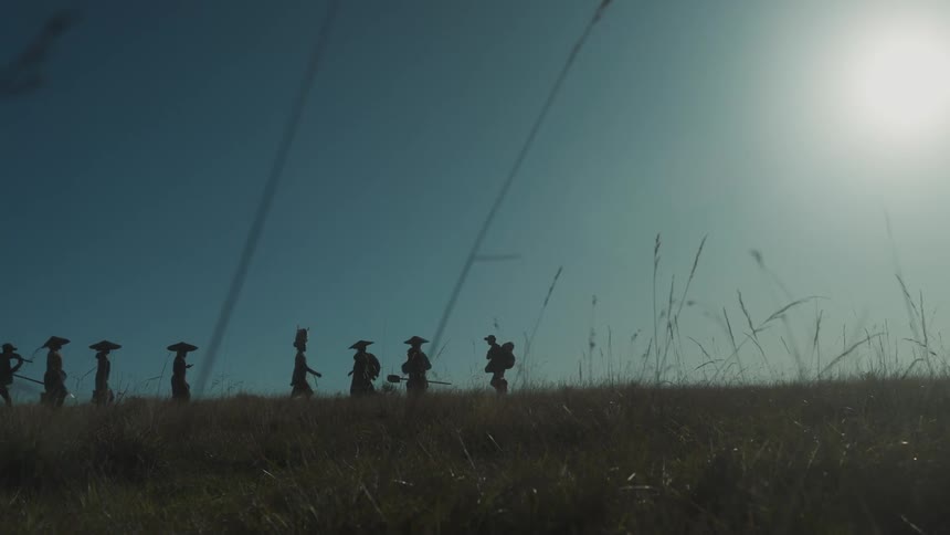 Backpackers cross with farmers on the mongolian plains