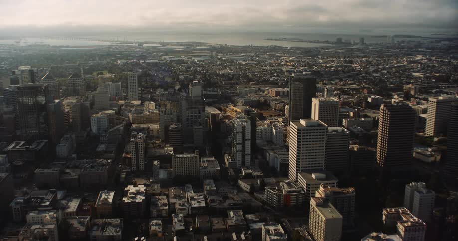 Oakland, CA, downtown, with San Francisco and the SF Bay in the distance