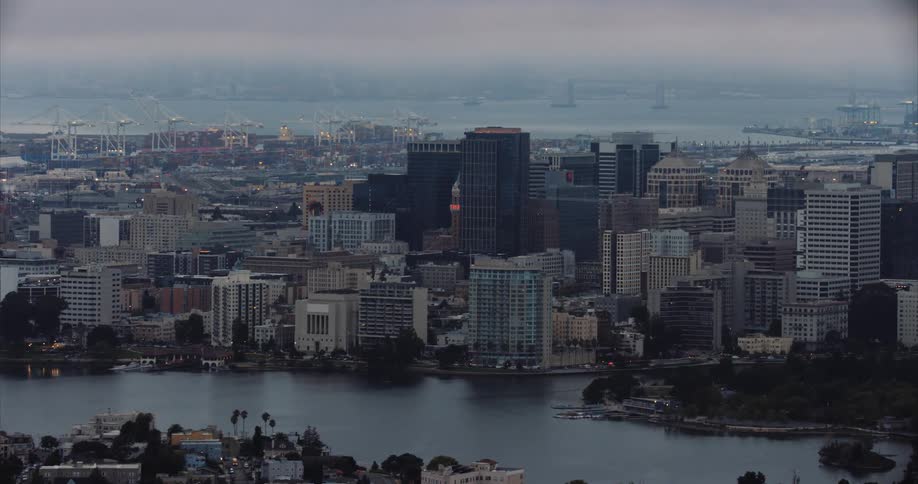 Helicotper aerial of Oakland California, the Alameda Estuary, and the San Francisco Bay at twilight