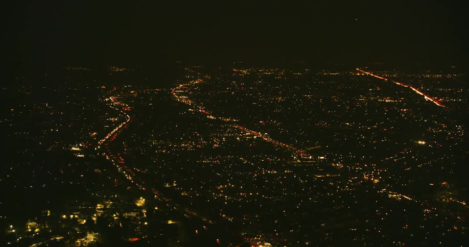 Aerial view of city lights at night, Oakland CA