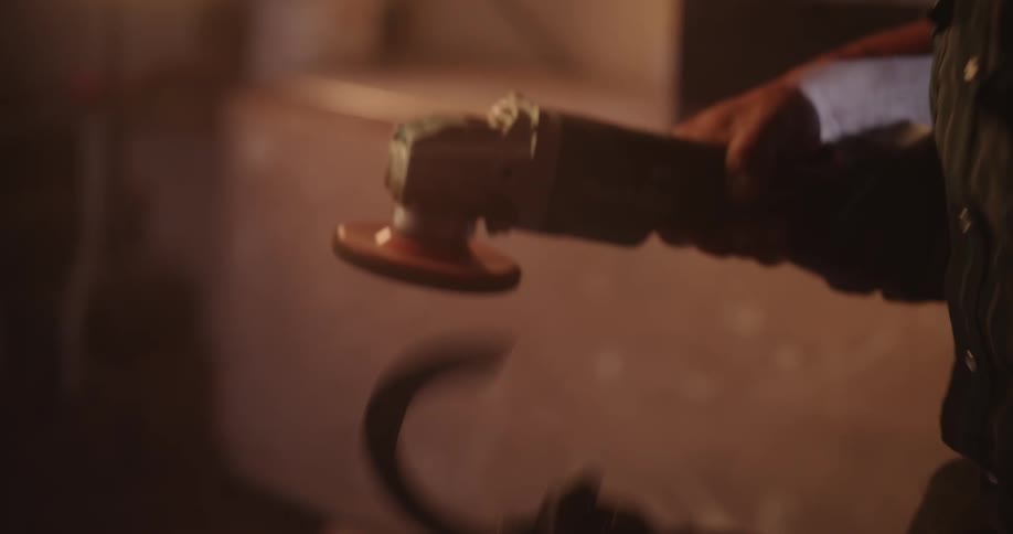 A clip of a welder making use of his tools