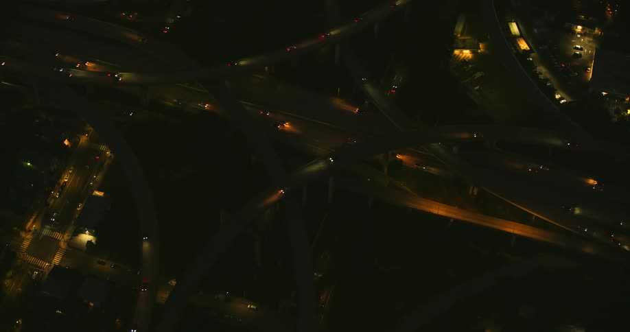 Cars driving on the highway at night seen from above, the Oakland Maze