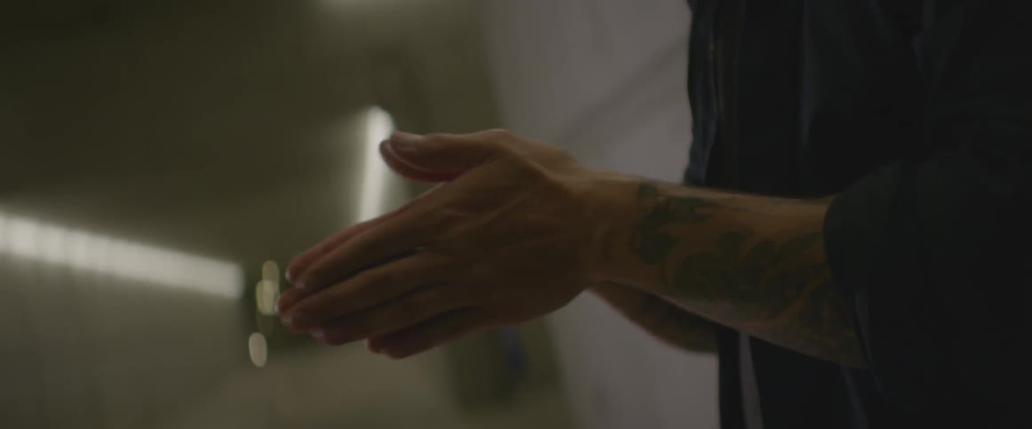 Man rubs palms of hands together rapidly