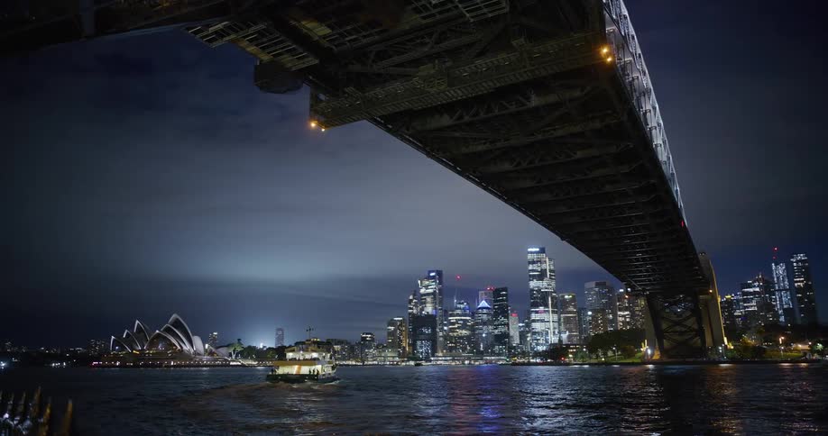A large bridge leads to the city