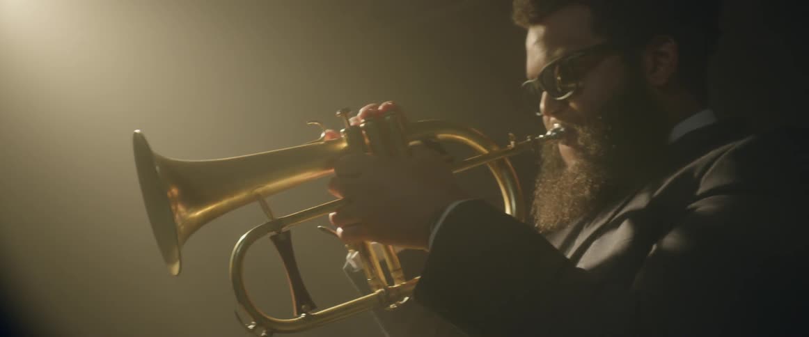 A trumpeter plays his instrument