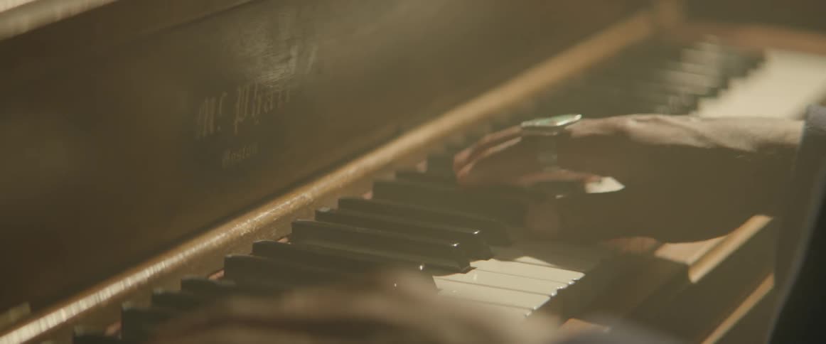 A pianist plays a song